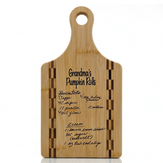 Bamboo recipe cutting board printed with a handwritten Grandma's Pumpkin Rolls recipe, front view with checkered inlay